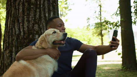 man with his dog at the park