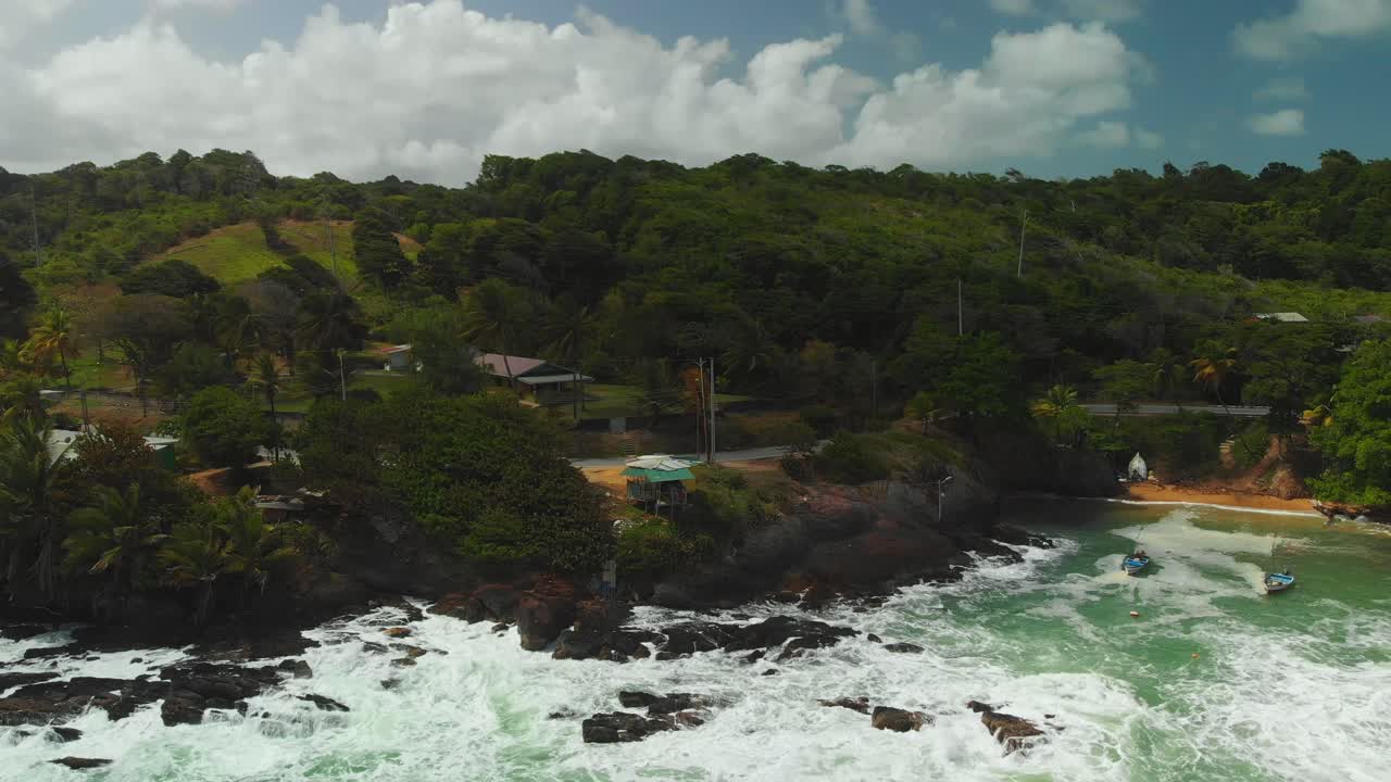Rough seas of the atlantic ocean crashing along the coastline of Cobra Bay on Trinidad northern coastline
