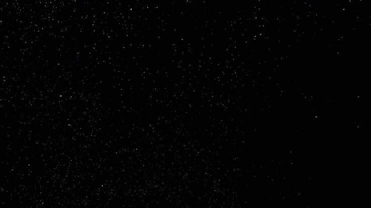 polvo flotando en el aire sobre un fondo negro 04