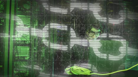 Animation-of-data-processing-over-asian-male-hacker-in-server-room