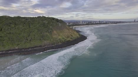 Burleigh-Heads-Beach-Against-Cloudy-Sky-In-Gold-Coast,-Australia---aerial-drone-shot