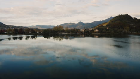 A-drone-pushes-towards-a-church-on-Lake-Caldonazzo