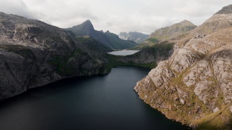 Aerial-view-of-Segla-mountain-above-the-sky,-Norway-during-summer