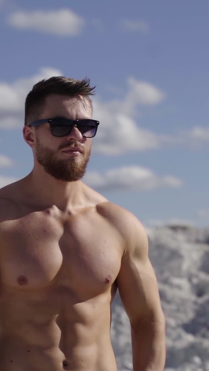 Handsome topless male model. Portrait of sporty handsome strong man