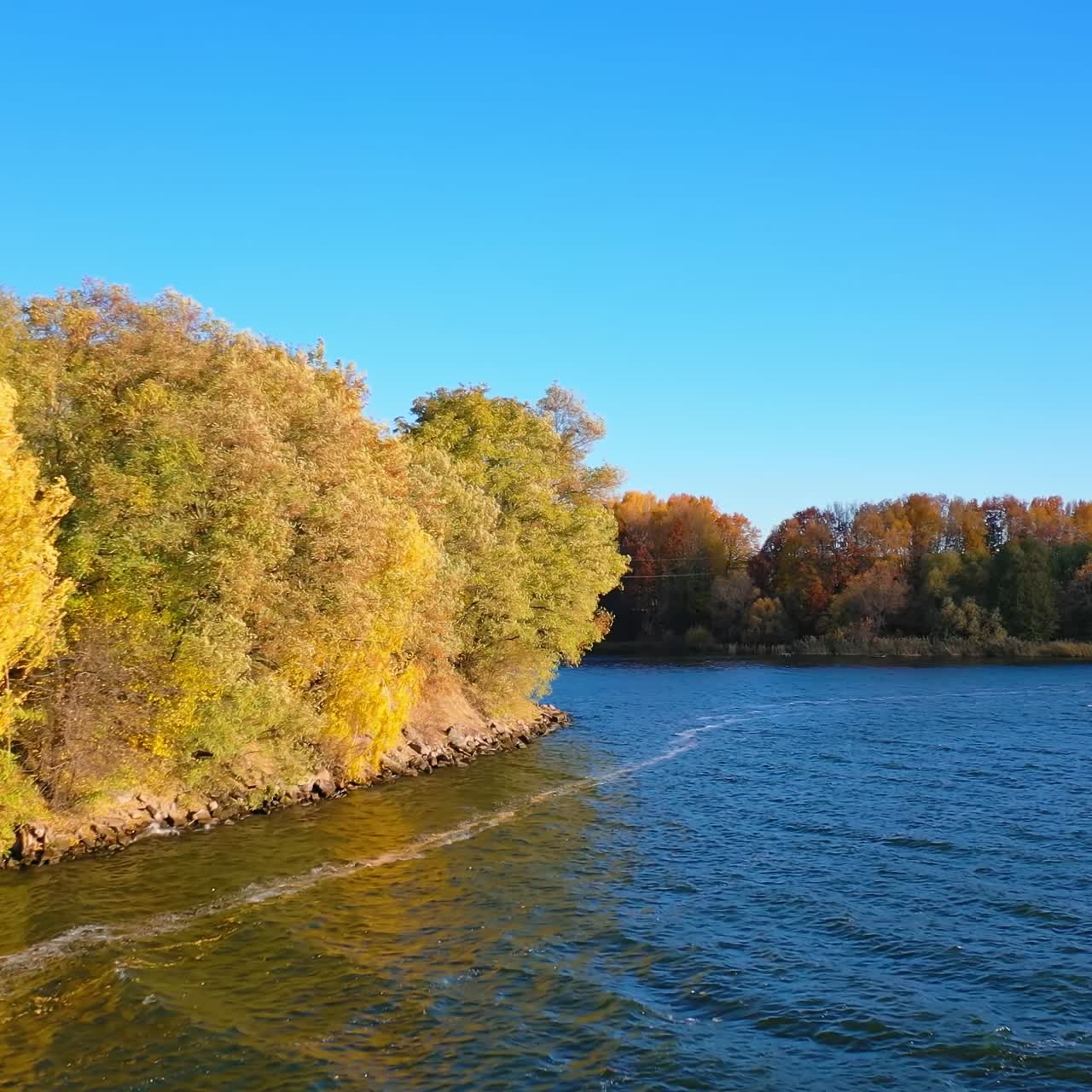 Natural outdoor autumn drone scenery. River beautiful landscapes aerial view