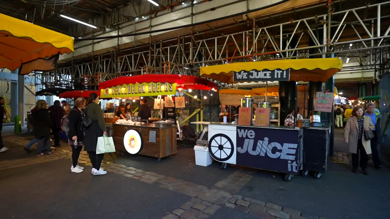Venezuelan arepas and fresh juices attract customers at London's bustling Borough Market