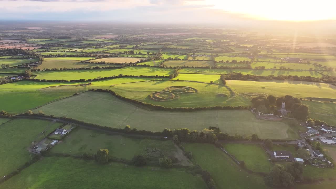 Hill of Tara aerial birds eye during magical sunset. Ancient heritage site in Ireland