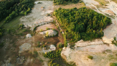 aerial flyover of land plot development tree clearing preparation for residential real estate building construction 4k