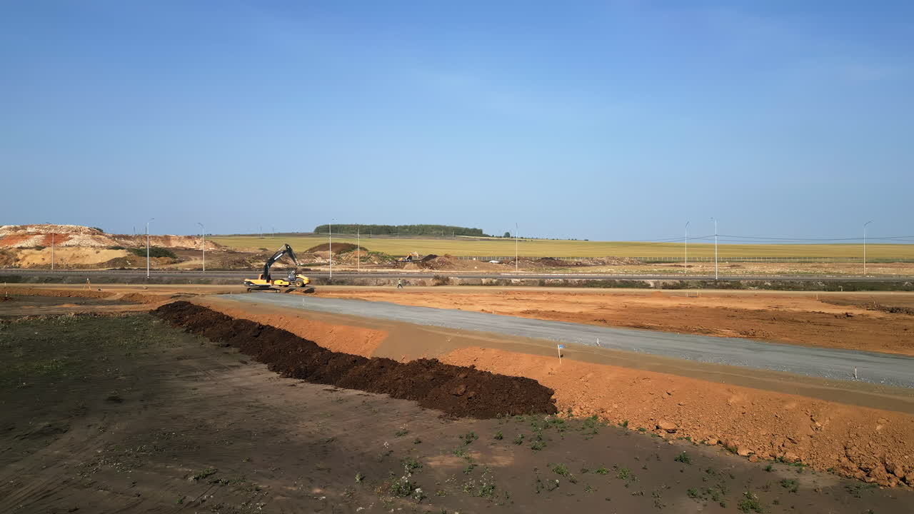 Highway Road Construction Site with Heavy Machinery