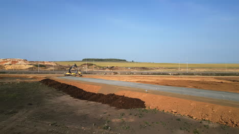 highway road construction site with heavy machinery