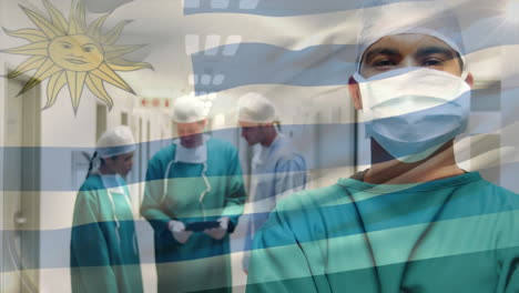 animation of flag of uruguay waving over surgeons in operating theatre