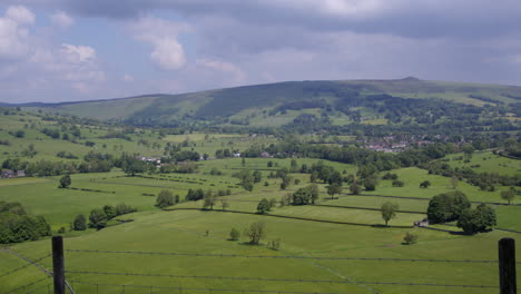 wide shot looking down into hope valley with barbed wire fence in foreground