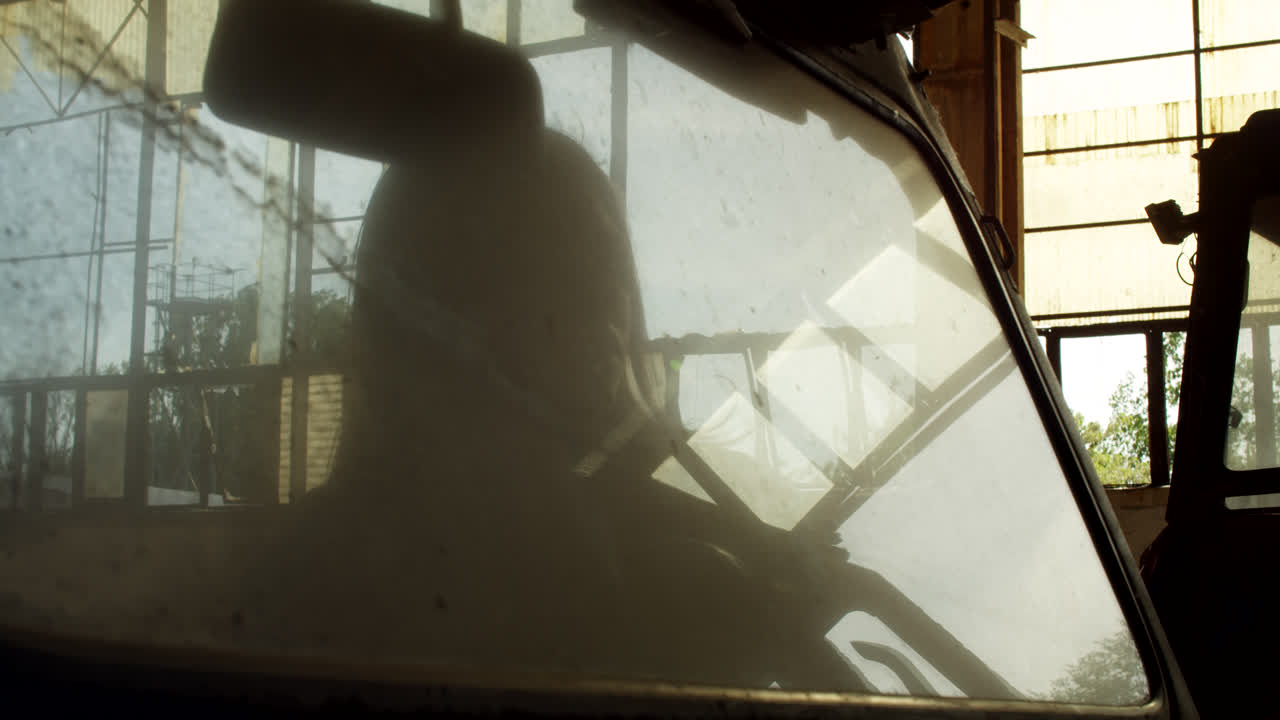 Woman Silhouette in an Abandoned Car