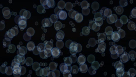 animation of bubbles drifting upward on black background