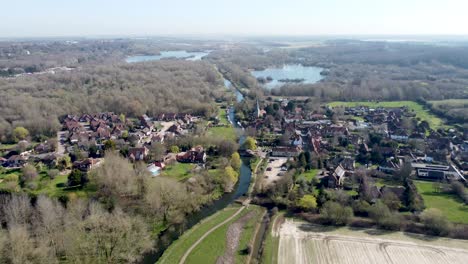 drone flies backwards away from the small village fordwich, england