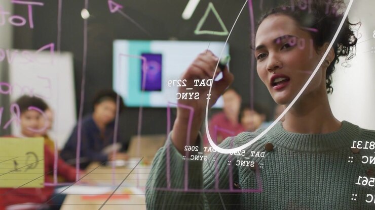 Female lead starting drawing on clear glass, sketching grid with data mirroring for tech demo