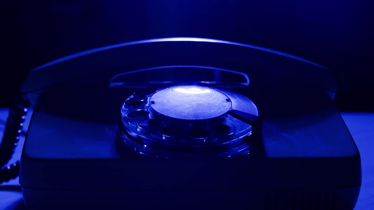 Retro vintage phone, A yellow rotary telephone is displayed on a wooden desk, adding a nostalgic touch