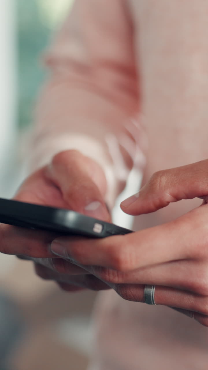 Close-up of Hands Typing and Scrolling on a Smartphone