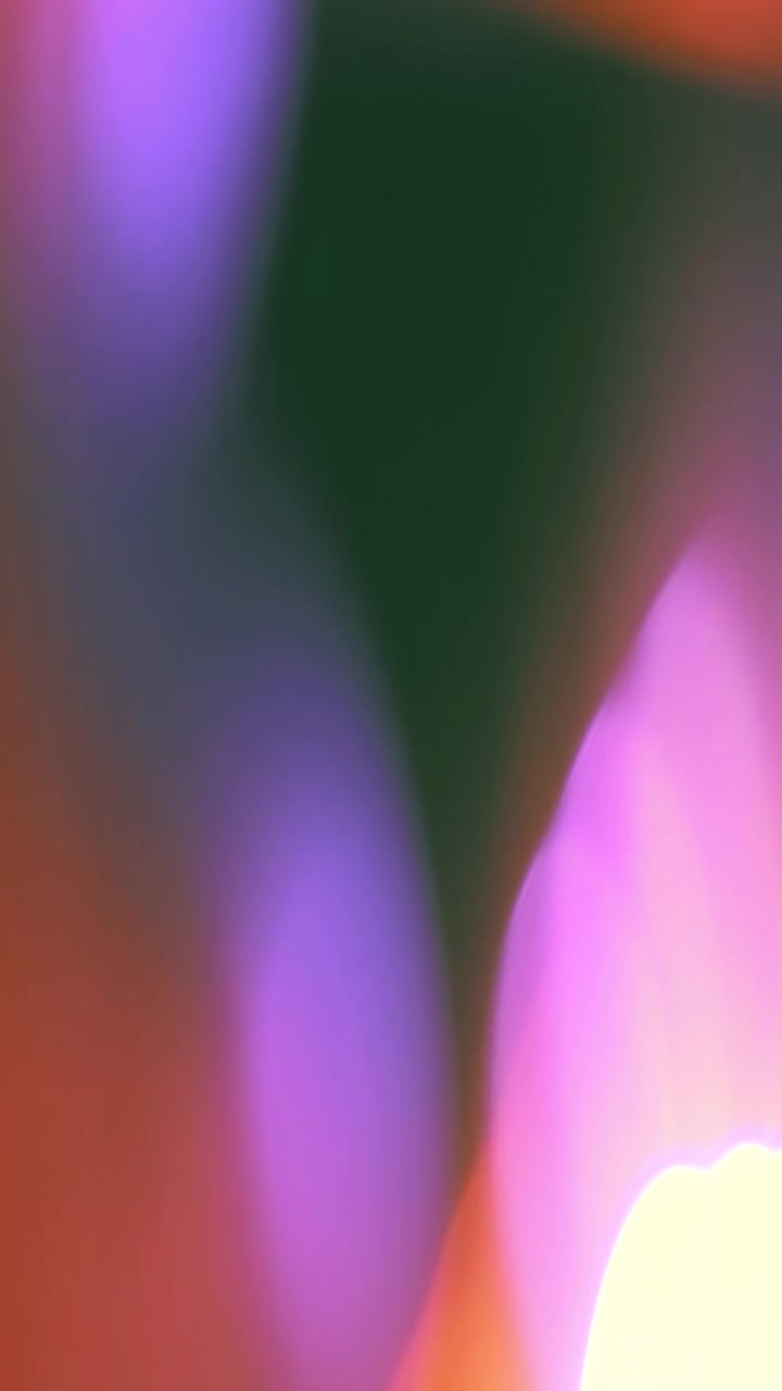 Abstract Light Leaks and Soft Color Transitions on Dark Background
