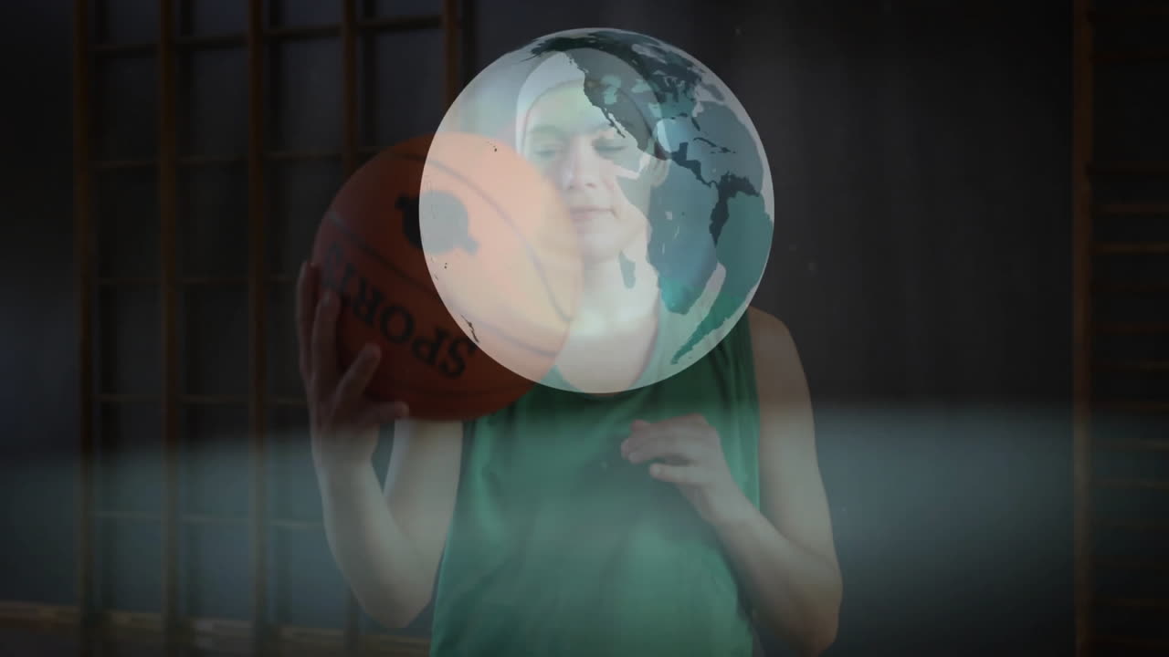 Holding basketball, person with globe animation overlay on face in school gym