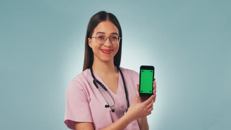 Nurse,-happy-woman-with-phone-and-green-screen