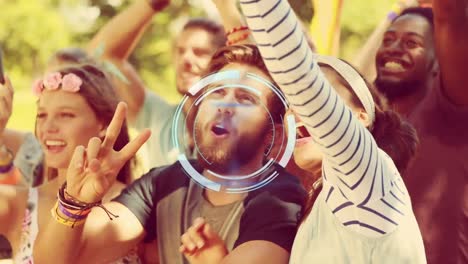 Neon-round-scanner-against-mixed-race-couple-taking-a-selfie-at-a-concert