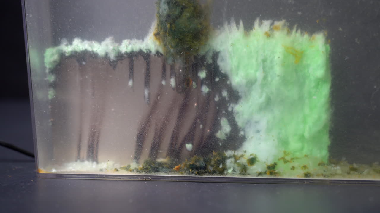 Build-up of electrolytic sludge on nickel plate during electroplating