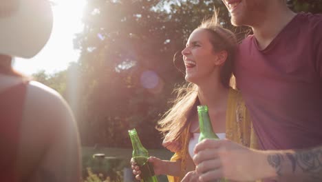 Group-of-young-friends-spending-time-on-the-camper-side.