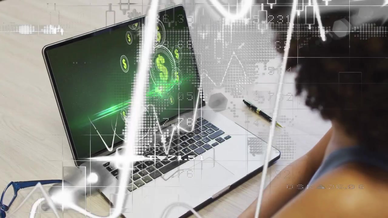 Woman sitting at desk watching laptop, graph lines starting, forming dollar icons, tracking markets