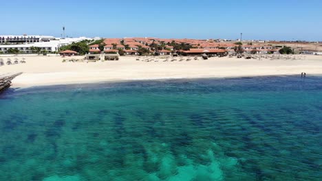 aerial view of bikini beach at cape verde with beach side villas