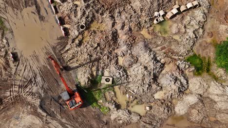 aerial view of construction site with excavator