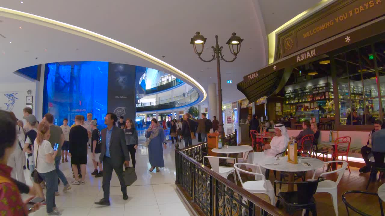 Inside the Dubai Mall, busy passage with many people