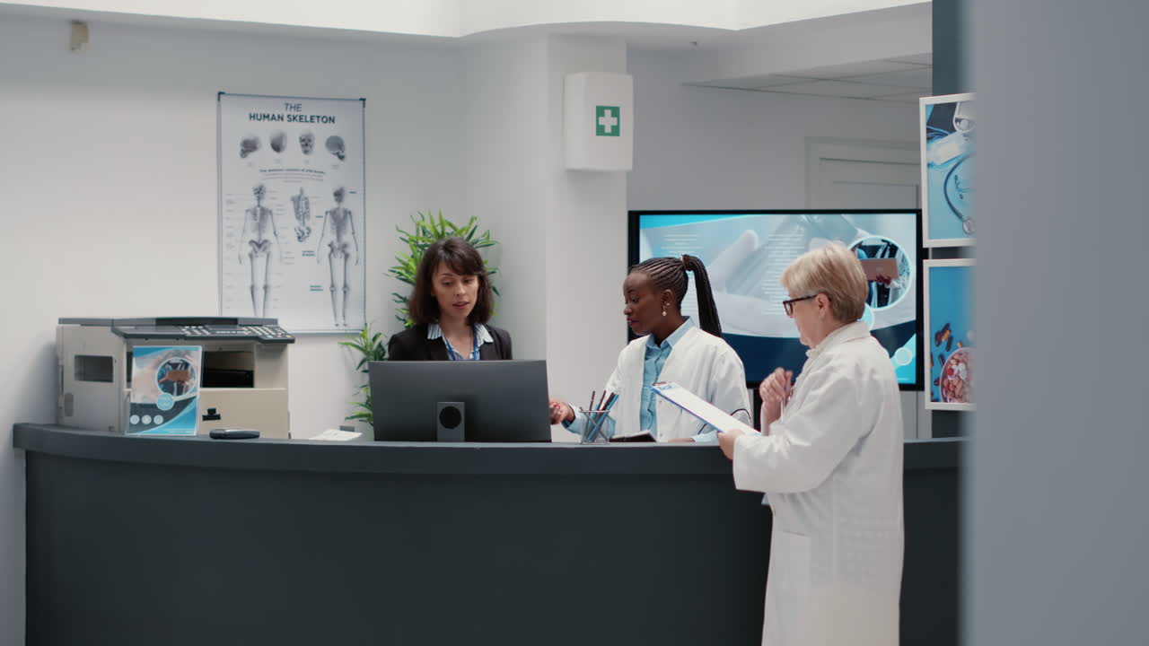 Healthcare Professionals Assisting Patients in a Hospital Setting ...