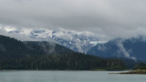 Snow-capped-mountains-covered-with-cloud-in-Juneau,-Alaska