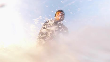 male-surfer-on-surfboard-riding-the-waves-and-falling-in-the-early-morning-time