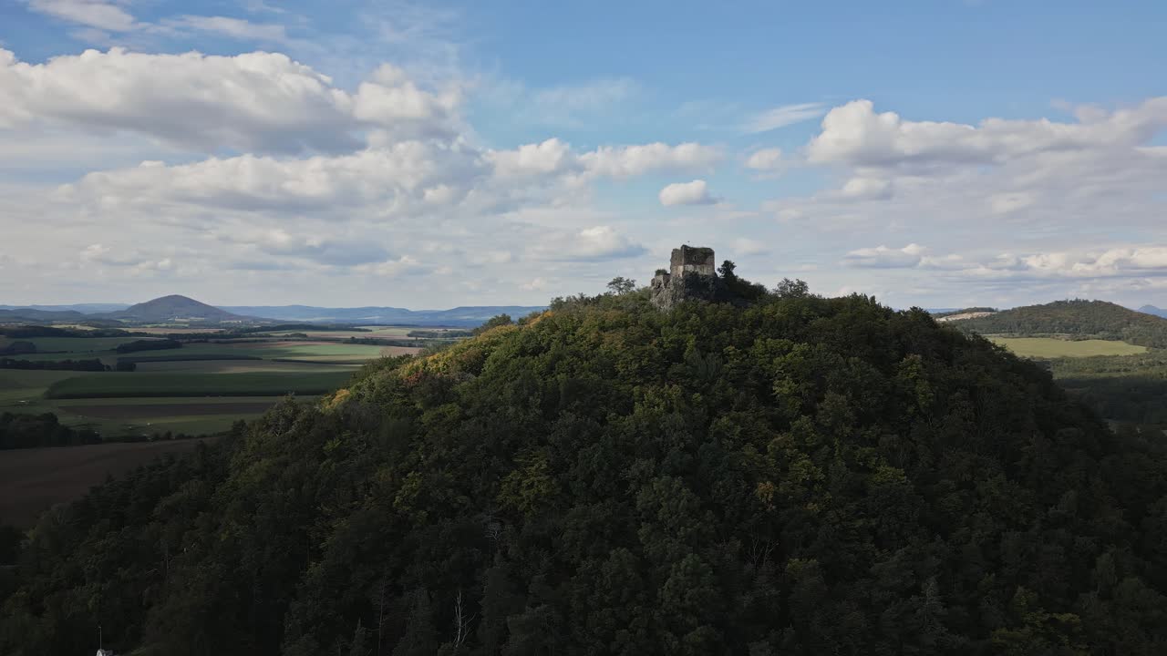 Aerial view of the beautiful autumn landscape dominated by the old ruins of Bernstein Castle