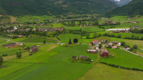 Aerial-arc-view-of-historic-Hopperstad-Stave-Church-in-Vikoyri,-Norway