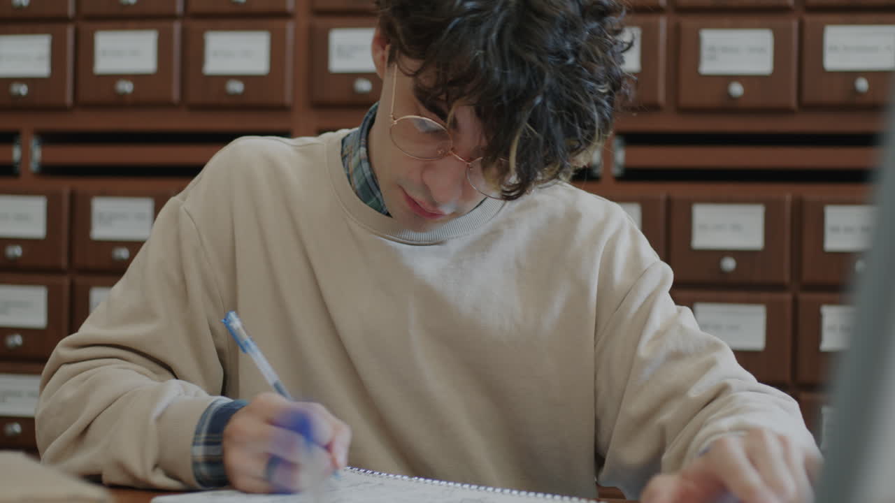 Student Studying in a Library