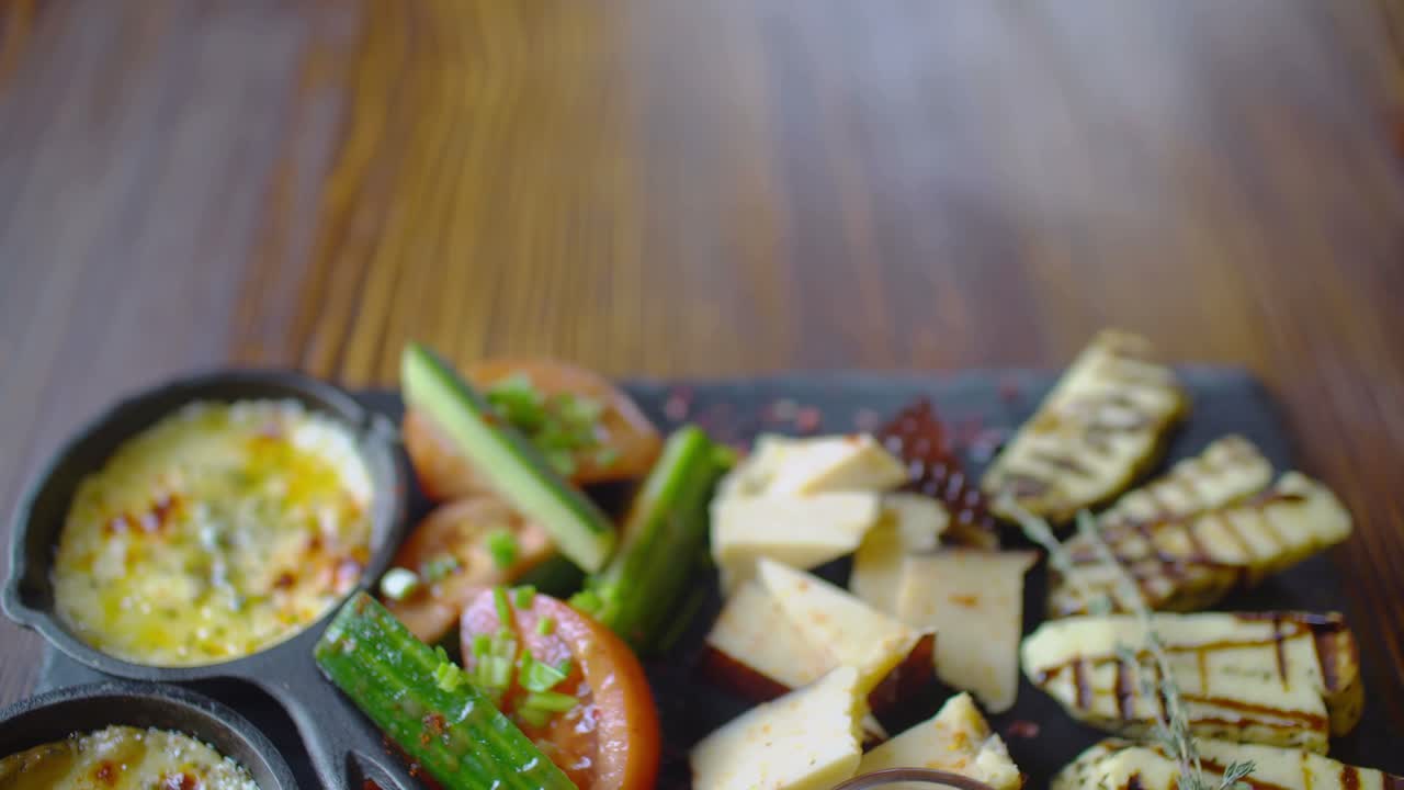 Assorted Cheese Platter with Grilled Vegetables and Dip