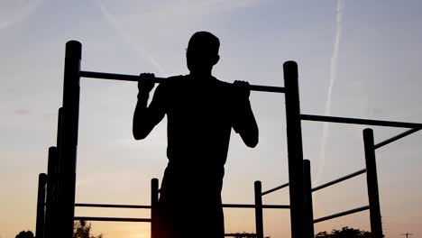 Young-Male-Exercising-Pull-Ups-With-Resistance-Band-001