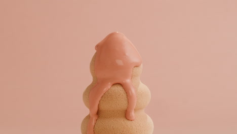 cosmetic product dripping on sponge