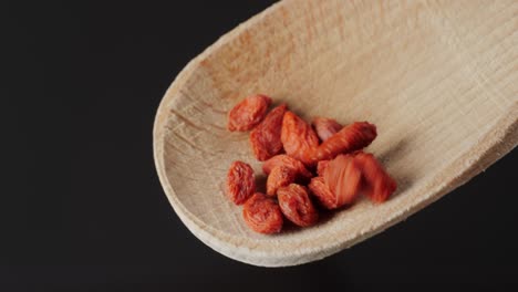 Goji Berries in a Wooden Spoon