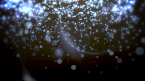 Blue-bokeh-and-particles-falling-with-Happy-New-Year-and-Merry-Christmas