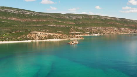 Aerial-Panning-Drone-Shot-of-an-Rock-Formation-along-the-Coast-in-Portugal