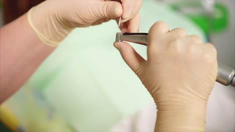 dental procedure: attaching a drill bit