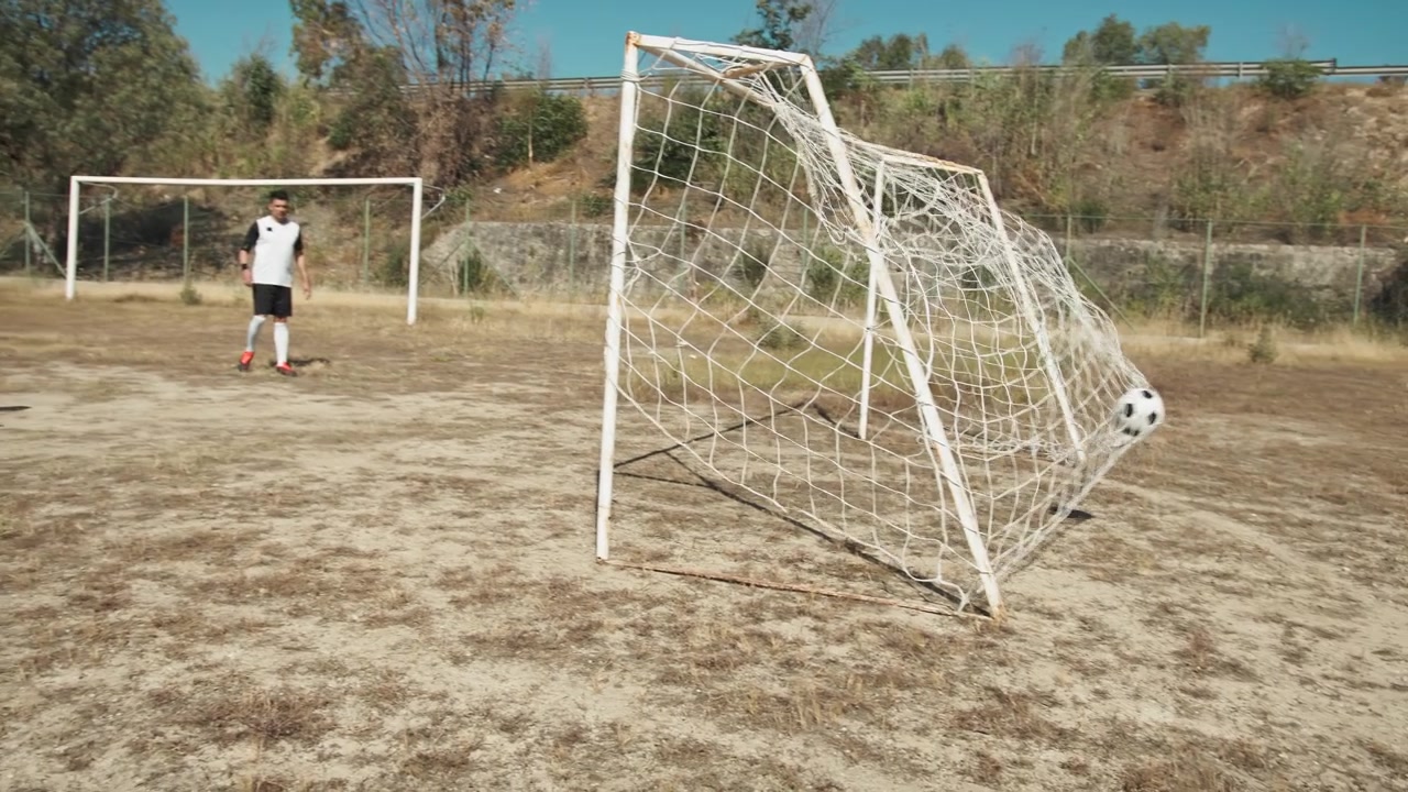 Soccer Players In Movement Passing The Ball And Shooting