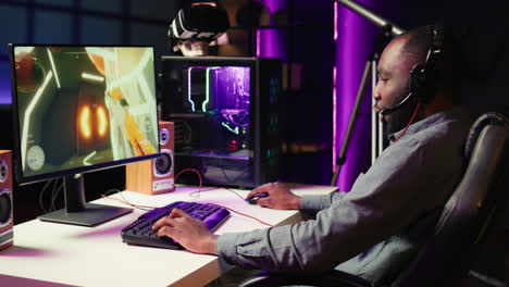 man using headset to play sf fps videogame, having fun, close up