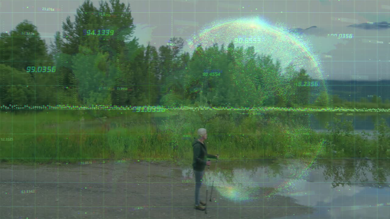 Man standing near lake with digital data and globe animation overlay