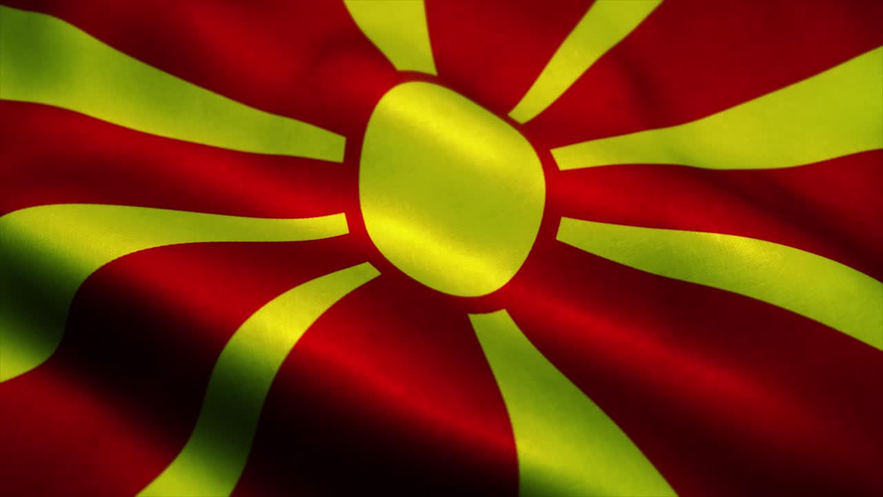 la bandera de macedonia ondeando en el viento. la bandera nacional de macedonia. el signo de macedonia animación de bucle sin costuras. 4k