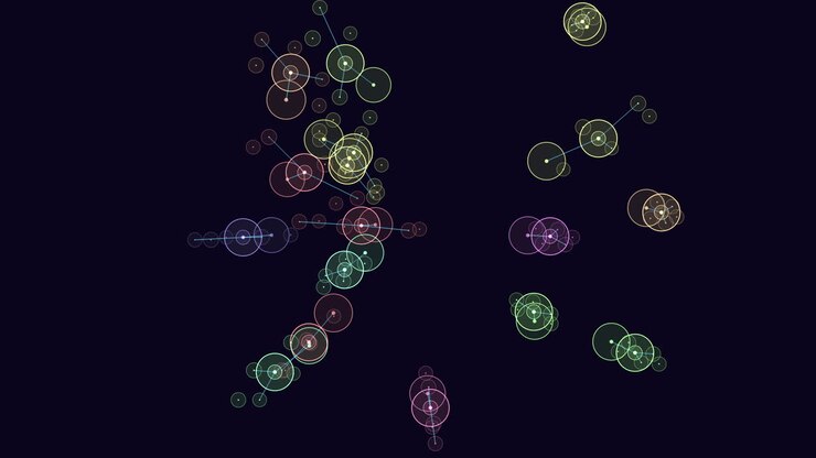 Abstract image depicting a visually stimulating pattern of multicolored circles against a black background. The varying hues and sizes create a captivating and dynamic visual composition